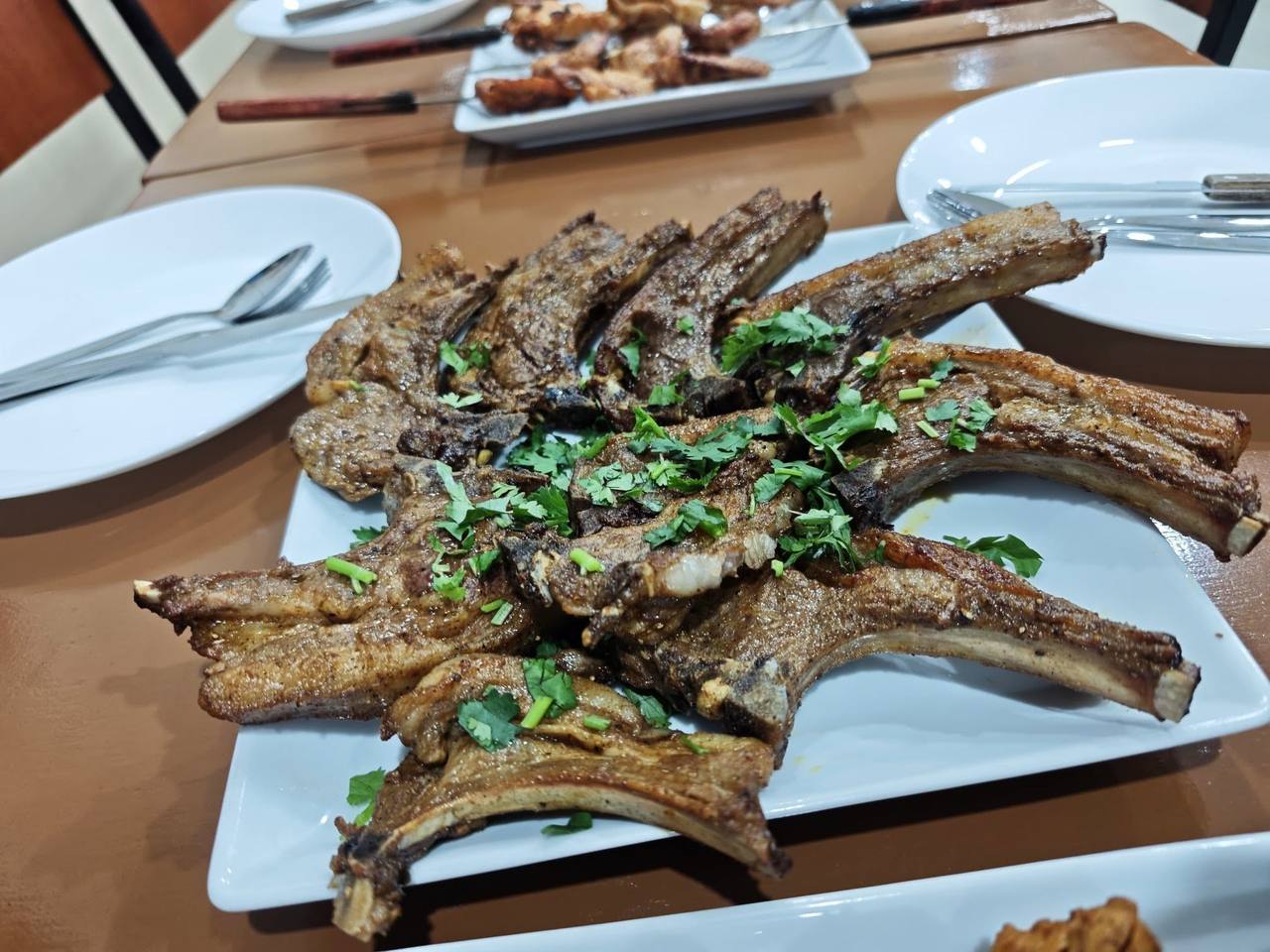 A spread of grilled BBQ dishes on the table
